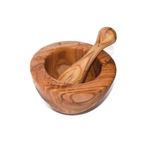 Mortar & pestle made by Cretan Olive wood -10cm Made by hand, olive wood mortars are ideal for crushing herbs and spices. Their hard surface can sustain the force of grinding and mashing. Smooth and nonporous, the wood will not absorb or trap any of the substance being ground. The natural pattern makes mortars great accessories to display in your kitchen.