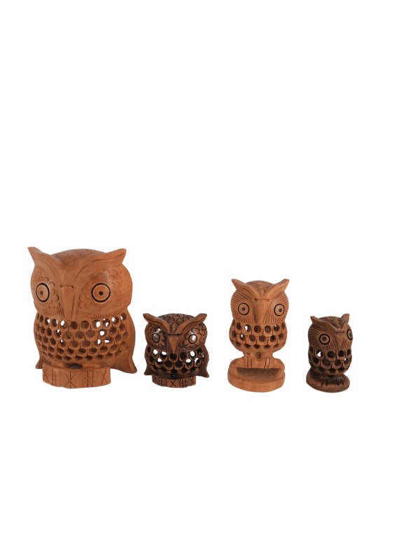 Wooden decorative owls in various dimensions. They are handmade and carved with great care, offering a unique option to upgrade your space! Each of these owls has an inner, smaller owl hiding inside. This design element lends an air of mystery and twist as it reveals hidden surprises. The large and bright eyes of the owl are a special feature of it. These eyes have the ability to see what most animals cannot perceive in the dark. From ancient times to the present day, the Greeks have recognized this quality of the owl and considered it a symbol of knowledge and wisdom.